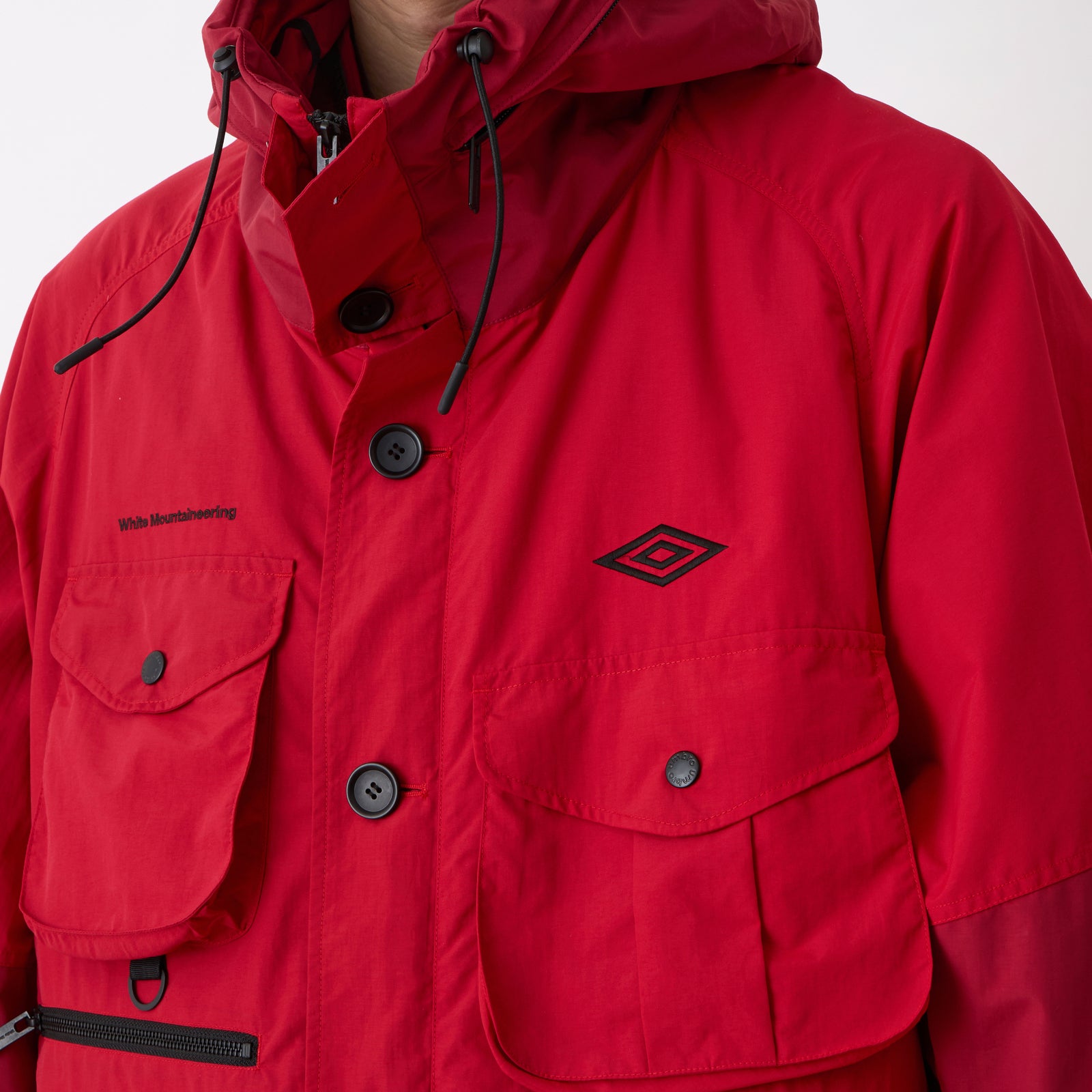 WM × UMBRO MULTI POCKET COAT - White mountaineering
