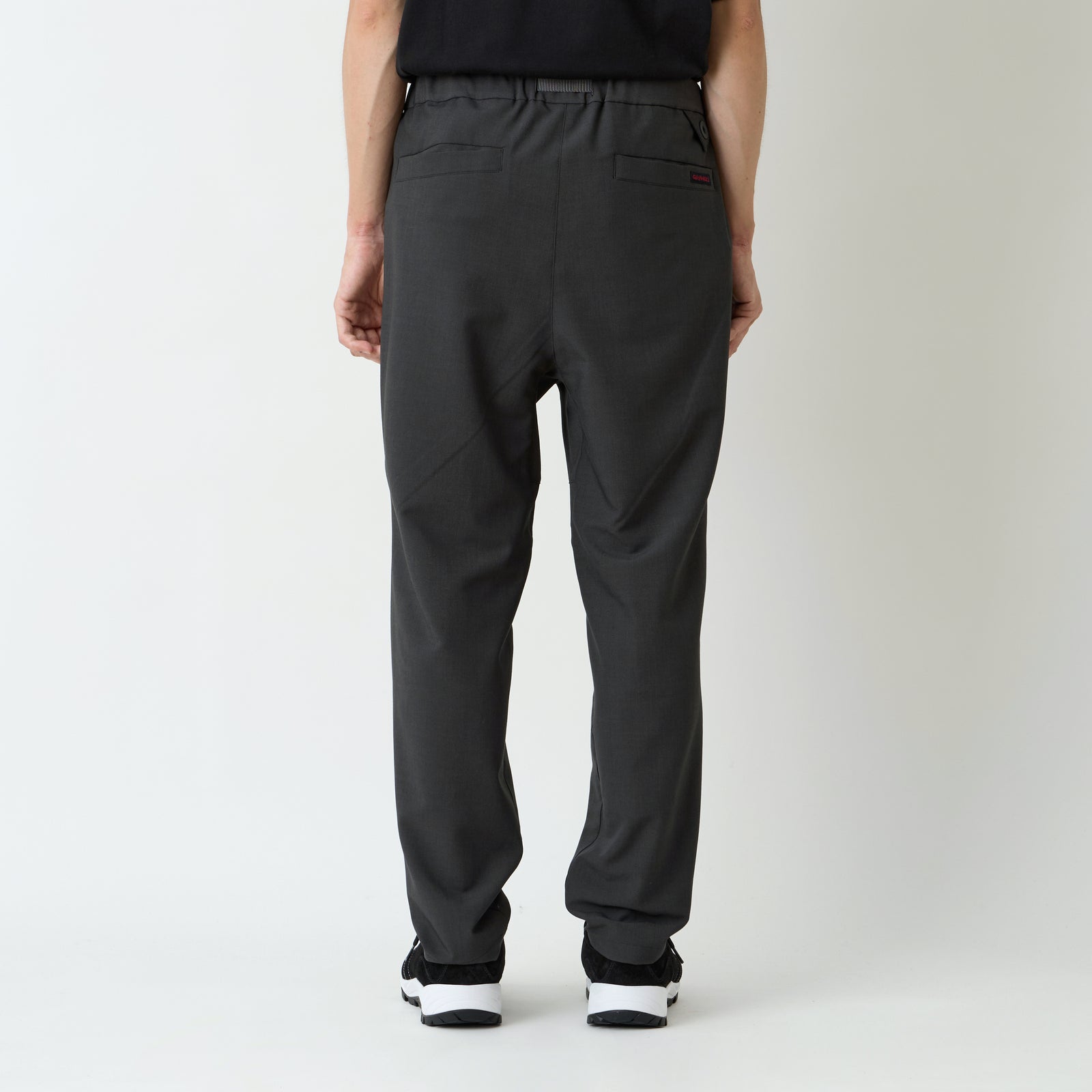 WM × GRAMICCI 2 TUCK TAPERED PANTS - White mountaineering